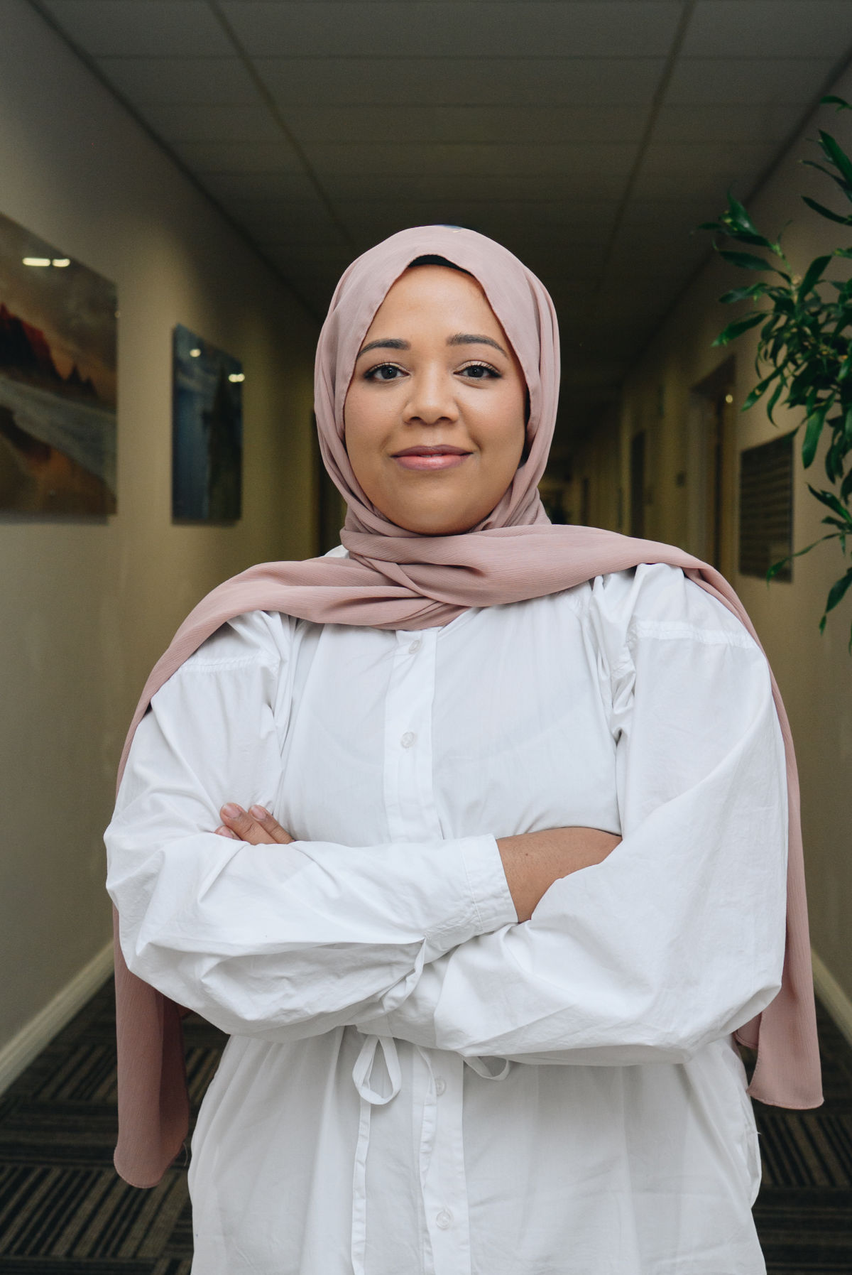 Dr Kashiefa Japtha consulting with a patient